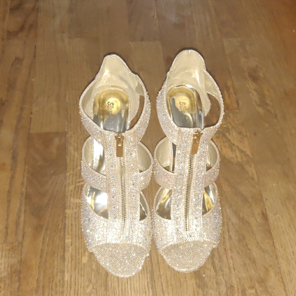 Golden goddess heels with diamond accents